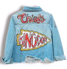 This is a jean jacket painted by hand, therefore the product you receive may be slightly different than the product shown, including colors and style of jacket unless specified otherwise. I am not a robot, therefore no products will be an exact replica. The denim jacket may vary depending upon availability. Therefore, the one pictured may not be the one you receive. Additional fees may apply.  If you have any questions about the process please let me know!  If you would like a specific brand of jacket, please add the listing below to your order. If it is not listed, please message me and I will accommodate to you. If you would like a specific brand of jacket, please add the listing below to your order. https://www.etsy.com/KreationsCoByKatie/listing/915167341/additional-fee-for-branded-jac Painted Denim Jacket Sports, Painted Denim Jacket School Spirit, Chiefs Denim Jacket, Game Day Denim Jacket, Chiefs Jean Jacket, Custom Jean Jacket Ideas, Painting Denim Jacket, Painted Apparel, Jean Jacket Painted