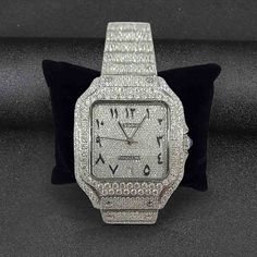 Iced Out Cartier Watch From Santos De Cartier Collection - A Genuine Luxury Timepiece Meticulously Embellished with Premium Quality Sparkling Round Cut White AAA Cubic Zirconia Diamonds in Stainless Steel Metal, Features Automatic Swiss ETA Analogue with Date Indicator, 40 mm Square Diamond Studded Dial with Arabic Numericals and 14k White Gold Rhodium Plated Smartlink Bracelet Strap. Iced Out Cartier, Cartier Diamond Watch, Square Diamond Studs, Cartier Collection, Iced Out Watch, Skull Engagement Ring, Watch Diamond, Couples Wedding Bands, Diamond Watches