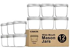 six mason jars with lids are shown in front of a cardboard box and the package is empty