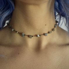 Simple & sweet labradorite choker. Check out our matching head chain: https://etsy.me/2DEyoyk One size fits all. About 12.5in-16in adjustable. If you are concerned with the size feel free to leave your measurements when you check out. This listing is for 1 choker. Necklace is made of gold plated copper. Water, lotion, fragrances, sweat (any kind of moisture) can cause discoloration. Shipped with minimal packaging to avoid unnecessary waste. ♥️🌎 Simple Necklace Choker, Chocked Necklaces, Cord Necklace Diy, Chocker Neckless, Gem Necklaces, Etsy Necklace, Boho Beaded Necklace, 90s Choker, Boho Choker Necklace