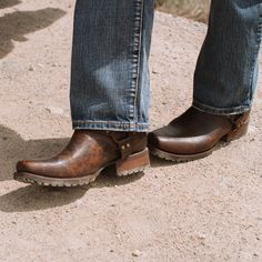 Rugged leather boots made the Stetson way. Handcrafted by Stetson’s legendary bootmakers from premium cow leather that’s designed to patina handsomely over time. Features include: premium cow seamless lining, harness, lug soles, brass nails and hand-driven lemonwood pegs that enable the boot to withstand the elements by expanding and contracting with any moisture the boot may encounter. Built for riding, each pair is lasted, stitched and tooled by hand to ensure absolute comfort and performance. Worn Cowboy Boots, Cowboy Work Boots, Cowboy Boot Photography, Suit With Boots Men, Zac Core, Cowboy Formal, Western Boots Men, Cowboy Core, Cowboy Boots Men