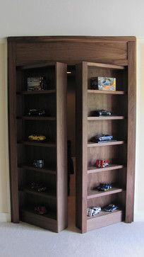 an open bookcase with toy cars in it