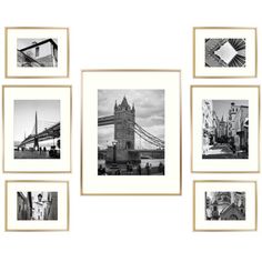 black and white photograph of the tower bridge in london, england taken from an angle