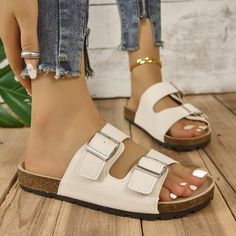 INCLUDES: Sandals FIT: This item is true to size AVAILABILITY: This item will ship separately from the rest of your order. Please allow 5-10 business days for shipping. FEATURES: Heel height: Flats Material: elastomer, polyester, pu Imported MEASUREMENTS: 35(US4):Foot length 8.8 in 36(US5):Foot length 9 in 37(US6):Foot length 9.2 in 38(US7):Foot length 9.4 in 39(US8):Foot length 9.6 in 40(US9):Foot length 9.8 in 41(US10):Foot length 10 in 42(US10.5):Foot length 10.2 in 43(US11):Foot length 10.4 in Summer Flat Heel Flip Flops With Buckle Closure, Flat Beach Slippers With Buckle Closure, Flat Slippers With Buckle Closure For The Beach, Flat Heel Beach Slippers With Buckle Closure, Flat Heel Slippers With Buckle Closure For Beach, Beach Slippers With Buckle Closure And Flat Heel, Synthetic Toe Post Flip Flops With Buckle Closure, Spring Flip Flops With Buckle Closure And Toe Post, Summer Flat Heel Slippers With Buckle Closure