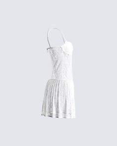 Give em' a taste of heaven in this white lace pleated dress 🤍 Made from stretchy lace, and complete with a lined bandeau bra, pleated skirt, fitted bodice, and drop waist that creates an elegant, and flowy look ✨ Leave little to the imagination -- dress is sheer & undergarments are not included 👀 Lace Dresses With Built-in Bra And Fitted Bodice, Strapless Lace Dress In Coquette Style, Strapless Lace Coquette Dress, Coquette Strapless Lace Dress, Strapless Fitted Lace Dress, Fitted Strapless Lace Dress, Fitted Lace Dress With Built-in Bra, Lace Mini Dress With Spaghetti Straps, Fitted Lace Mini Dress With Built-in Bra