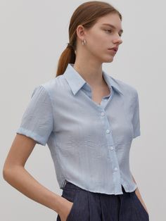 Editor's notesTRIP LE SENS' stylish and trendy cropped-length shirt is made of pleats fabric with a breathable and comfy fitting.- Button closure- Regular collar- Pleats fabric- Cropped length- Breathable and comfy fabricMeasurements(in.)S/M- Length: 18.89 / 19.29 in.- Shoulder: 14.96 / 15.74 in.- Chest: 18.11 / 18.89 in.- Sleeve: 7.08 / 7.48 in.Model infoMan - 6'03 Fitting size LWoman - 5'64 Fitting size MComposition & Care- 80% Polyester, 20% Nylon- Dry cleaning- Do not tumble dry- Do not bleach- Iron at low temperature with clothDesigner- by TRIP LE SENS Classic Cropped Summer Shirt, Classic Collared Cropped Shirt For Summer, Chic Fitted Cropped Shirt With Short Sleeves, Classic Button-up Cropped Shirt For Summer, Chic Fitted Short Sleeve Cropped Shirt, Cropped Relaxed Fit Blouse With Buttons, Fitted Collared Cropped Shirt For Summer, Fitted Collared Cropped Shirt For Daywear, Elegant Collared Cropped Shirt For Spring