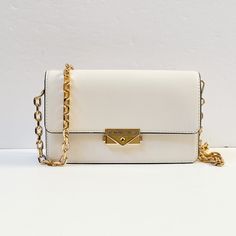 New With Tag Michael Kors Cece Medium Shoulder Crossbody Bag Clutch Vegan Leather Optic White 100% Authentic Retail: $448.00 Plus Tax *Please See The Measurement For The Size* Tag Said Medium But The Bag Is Small No Dust Bag Flap Closure Michael Kors Logo At Front Silver Toned Hardware Custom Fabric Lining 3 Card Slots 8.75" (L) X 5.5"(H) X 2.5"(D) Adjustable & Detachable Long Strap Very Clean, Smoke-Free And Pet-Free Environment White Crossbody Evening Bag With Phone Holder, White Crossbody Evening Bag For Mobile Phone, White Crossbody Clutch With Phone Pocket, White Crossbody Mobile Phone Clutch, White Crossbody Clutch For Mobile Phones, Elegant White Mobile Phone Bag, White Clutch Flap Bag With Dust Bag, Cream Evening Shoulder Bag With Mobile Phone Pocket, White Crossbody Evening Bag For Everyday