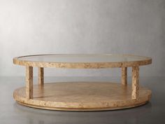 a round coffee table with a glass top