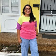 Color Block Tee With The Cutest Color Combos?! We Are Obsessed!! This Tee Gives The Perfect Oversized Fit And Goes Great With All Bottoms! Jeans, Trousers, Cargos, Skirts, Leggings- You Name It! The Coral, Purple, And Green Makes It Easy To Style With So Many Colors And Neutrals! True To Size. 76% Polyester 21% Rayon 3% Spandex Color Block Design With Coral, Purple, And Green Style With Skirts, Jeans, And Flare Pants! Looks Great With Blues, Yellows, And Neutrals! Kalianna Is 5'7 Wearing A Size Trendy Yellow Color Block Tops, Yellow Color Block T-shirt For Spring, Spring Yellow Color Block T-shirt, Casual Yellow Color Block Top, Casual Color Block Cotton Blouse, Casual Cotton Color Block Blouse, Casual Color Block Blouse For Spring, Casual Yellow Color Block T-shirt, Casual Color Block Tops For Spring