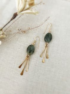 "All Designs, Copyright © 2017 Nox Jewelry  The Starla earrings are made from your choice  14k Gold Filled or Sterling Silver. Each earring is paired with your choice of gemstone: lapis, labradorite, chrysoprase, iolite or kyanite. Metal fringe ( cut to shape and hammered  tips) is added giving this earring beautiful movement.  - 14k gold filled or Sterling silver Ear Wires  - Choice of gemstone: lapis, labradorite, chrysoprase, iolite or kyanite - Approx Size: 2.5\" Long ( at its longest point) Gemstone Earring Ideas, Fall 2024 Fashion Trends Jewelry, Unique Jewelry Photography, Earring Photography Styling, Metal Fringe Earrings, Jewelry Inspo Aesthetic, How To Solder Jewelry, Ear Jewelry Ideas, Earring Making Ideas