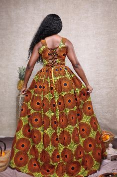 Our Elegant African Print Maxi or Ball gown. This beauty can be altered and customized to suit your preferred style. The maxi dress is handmade to order and with your right measurements you’ll get the perfect fit. This beautiful long African print maxi dress is made for all events. I have size Medium, large and Xlarge in stock, other size are made to order. Round neck with corset back as seen in the picture. .Material 100% African print cotton. .sleeveless with pockets on both sides. .Perfect su Corset African Dress, Long Ankara Dress Styles Gowns, Long Ankara Dress Styles, Long Maxi Dress Outfits, Ankara Dress Styles For Church, Long Ankara Dresses, African Print Maxi Dress, Kitenge Designs, Dinner Gown