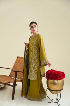 Hadeela Semi-stitched Banarasi Silk Sharara With Dabka Work, Semi-stitched Slub Silk Sets With Dori Work, Bollywood Style Green Dola Silk Sets, Green Zari Work Lehenga In Dola Silk, Green Semi-stitched Dola Silk Sets, Green Lehenga In Dola Silk With Zari Work, Green Lehenga With Zari Work In Dola Silk, Green Dola Silk Bollywood Sets, Green Bollywood Dola Silk Sets