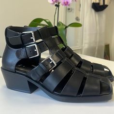 Questions? Leave A Comment Below! Edgy Spring Platform Sandals, Edgy High Heel Sandals With Buckle Closure, Edgy Spring Heels With Buckle Closure, Edgy Sandals With Ankle And Heel Straps, Leather Strappy Sandals With Stacked Heel, Edgy Closed Toe Sandals With Buckle Closure, Edgy Open Toe Sandals With Heel Strap, Edgy Spring Sandals With Buckle Closure, Edgy Open Toe Heels With Buckle Closure