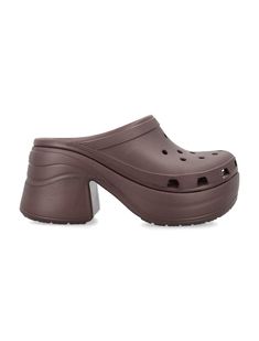 Rubber Siren Clog By Crocs. Featuring: Fully Molded Clog Round Toe Mule Style Water-friendly Ventilation Ports For Breathability Customizable With Jibbitz Charms Heel: 9. 5cm Platform: 3. 5cm Composition: 100% thermoplastic (EVA) Crocs Siren Clogs Outfit, Siren Clog Crocs, Croc Pollex Clog, Gardening Shoes, Crocs Pollex Clog, Crocs Clog, Saint Laurent Shoes, Prada Leather, Unisex Shoes