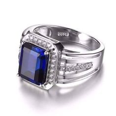 Reginald 4.3CT Emerald Cut Swiss Blue Sapphire IOBI Precious Gems Men's Ring,emerald cut sapphire ring, 4.3ct simulated blue sapphire ring,men's style sapphire ring Emerald Cut Sapphire Ring, Blue Sapphire Wedding Band, Mens Ring Designs, Ring Emerald Cut, Sapphire Wedding, Silver Jewels, Gem Ring, Men Diamond Ring, Men's Jewelry Rings