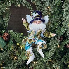 a christmas ornament is hanging on a wreath