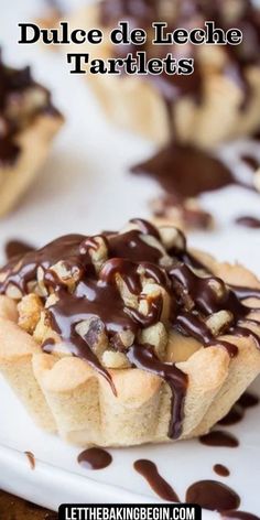 chocolate drizzled on top of tartles on a white plate