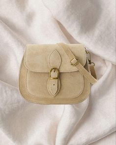 Our Suede Bag Saffron is the perfect sized every day handbag and an updated classic for every wardrobe. All leather, this to-go piece features a fold over top with a magnet closure and a discrete internal zip pocket. The adjustable, detachable suede strap allows you to wear it short or long, across the body or on the shoulder. Use it to hold your phone and wallet when dashing up the street for coffee or pair it with a floaty dress and fine jewels for a lunch date. This bag is a great statement p Suede Bag, Floaty Dress, Fine Jewels, Everyday Bag, Italian Leather, Leather Handmade, Purses And Handbags, Netherlands, Zip Pockets