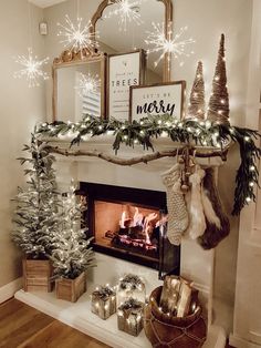 a fireplace decorated for christmas with presents and stockings