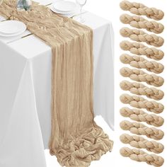 the table is set with white plates and napkins, along with several pieces of rope