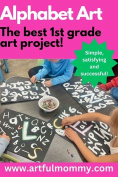 children are sitting at a table with letters and numbers on it, while one child is writing