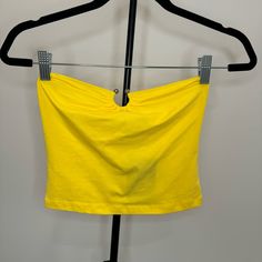 Brand New With Original Tag Never Worn Cropped Tube Top U-Ring Hardware Ruched Detail Stretch 95% Cotton 5% Spandex Fitted Yellow Seamless Crop Top, Trendy Yellow Sports Top, Yellow Seamless Summer Top, Yellow Cotton Workout Top, Fitted Yellow Tops For Sports, Casual Yellow Seamless Tops, Yellow Workout Tops For Summer, Summer Workout Yellow Tops, Yellow Stretch Crop Top