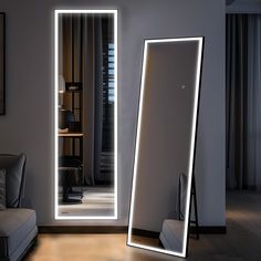 an illuminated mirror in the middle of a room with a couch and chair next to it