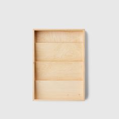 an empty wooden box on a white background