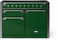 a green stove top oven sitting next to a white wall