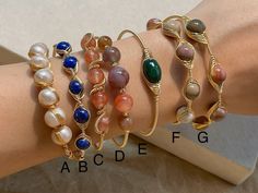 Stone: Freshwater pearl, Lapis Lazuli, Red Agate, Malachite, Alashan Agate, Amethyst with gold filled wire detail SIZE:  one size, fits 15-16cm wrist  Closure: - fixed open end, the band is stretchable  17cm at max suggested. if you're not sure about the sizing, feel free to send me a DM I'm happy to help Wire Wrapped Jewelry Bracelets, Wire Wrapped Gold Bracelets For Festival, Gold Wire Wrapped Bracelets For Festivals, Gold Wire Wrapped Bracelet For Festival, Handmade Bohemian Bangle As Gift, Handmade Bohemian Bangle With Round Beads, Bohemian Handmade Bangle With Round Beads, Bohemian Bangle As A Gift With Unique Variations, Gold Wire Wrapped Beaded Bracelets For Healing