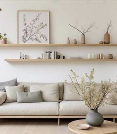 a living room filled with lots of furniture and decor