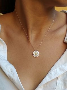 A perfect daisy gift to your girlfriend, daughter, wife, friend or even to your bridesmaid 🌼 Get this beautiful minimalist jewelry made with the quality of perfect elements✨ You can choose 925K Sterling Silver with the options of Gold, Rose Gold or White Gold colors as well as 14K solid Gold material. High quality jewelry for everyone 🤍 Details * 925K Sterling Silver Option → 14K Gold, Rose Gold or White Gold plated * 14K Gold Option → approximately 3.90 gram * Chain length is approximately 18 inches (16+2 in extender) / 45 cm (40+5 cm extender) * Time is everything! You will receive your package as soon as possible 🚚 * We care about the quality of metal to make sure it will last for a long time * We use enamel technique to color the jewelry and high quality zircons only * There can be White Flower Pendant Necklace As Gift For Mom, Dainty White Gold Flower Necklace, Elegant White Flower Necklace With Birth Flower Detail, Elegant White Flower Necklace For Birth Month, Elegant White Flower Necklace For Birthdays, Elegant White Birth Flower Necklace, Dainty Daisy Necklace For Gift, Elegant Daisy Shaped Jewelry, White Dainty Flower Necklace As Gift For Her