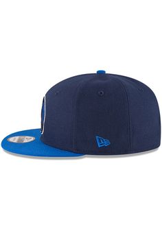 Wear your Mavericks style with pride in this Dallas Mavericks New Era Navy Blue 2T 9FIFTY Snapback Hat! This Dallas Snapback Hat features a front embroidered team logo. Win Mavericks!! New Era Basic 9FIFTY, Team logo embroidered on the front, New Era flag embroidered on the left side, Plastic snapback, Adjustable Closure, Polyester material, Polyester, Wipe clean with cloth or cleaning kit, 4 Blue Collegiate Hat With Flat Brim, Collegiate Blue Hats For Streetwear, Casual Blue Hat For Fan Gear, Casual Blue Fan Gear Hat, Collegiate Blue Snapback Hat With Flat Bill, Blue Sports Hat With Short Brim, Blue Casual Snapback Hat For Fan Gear, Blue Casual Snapback Hat For Sports Fans, Blue Casual Snapback Hat For Fans