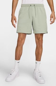 Whether hanging out of hitting the gym, comfort is key in these versatile shorts made with handy pockets for essentials and the brand's Dri-FIT moisture-wicking technology. 7" inseam; 24" leg opening; 10" front rise; 12 1/2" back rise (size Medium) Elastic/drawstring waist Hidden side-zip pockets; back drop-in pocket Dri-FIT moisture-wicking technology 78% polyester, 22% cotton Machine wash, dry flat Imported Functional Cotton Shorts With Built-in Shorts, Nike Gym Shorts With Elastic Waistband, Cotton Activewear Shorts For Training, Relaxed Fit Athletic Shorts With Built-in Shorts, Nike Sports Shorts With Side Pockets, Nike Athletic Shorts With Pockets, Nike Gym Athletic Shorts, Nike Sportswear Athletic Shorts, Nike Activewear With Shorts For Summer