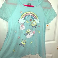 Nwt Girl’s Despicable Me Flowy Top In A Light Blue Color With Eyelet Sleeves. Playful Crew Neck Tops For Sleepover, Multicolor Short Sleeve Bedtime Top, Spring Cartoon Print Tops For Sleepover, Cartoon Print Tops For Spring Sleepover, Cartoon Print Tops For Sleepover In Spring, Cartoon Print Tops For Sleepover, Spring Season, Playful Blue Top For Sleepovers, Playful Blue Tops For Sleepover, Playful Blue Top For Sleepover