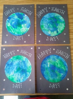 three cards with the words happy earth day written on them