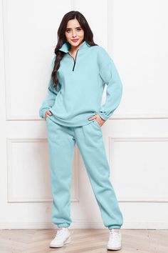 Features: Basic style Number of pieces: Two-piece Stretch: No stretch Material composition: 95% polyester, 5% spandex Care instructions: Machine wash cold. Tumble dry low. Imported Product measurements: Top:S: bust 46 in, sleeve length 20.3 in, length 27.3 inM: bust 47.6 in, sleeve length 20.7 in, length 27.7 inL: bust 49.1 in, sleeve length 21.1 in, length 28.1 inXL: bust 50.7 in, sleeve length 21.5 in, length 28.5 in2XL: bust 52.3 in, sleeve length 21.8 in, length 28.9 inBottoms:S: waist 25.7 in, hip 41.3 in, length 39.8 inM: waist 27.3 in, hip 42.9 in, length 40.2 inL: waist 29.6 in, hip 45.2 in, length 40.6 inXL: waist 32 in, hip 47.6 in, length 41 in2XL: waist 34.3 in, hip 49.9 in, length 41.3 in Half Zip Long Sleeve, Maxi Dress Formal, Jogger Set, Long Sleeve Sweatshirt, Basic Style, Pastel Blue, Denim Top, Long Sleeve Sweatshirts, Half Zip