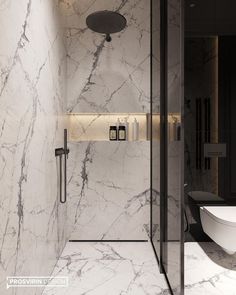 a bathroom with marble walls and flooring