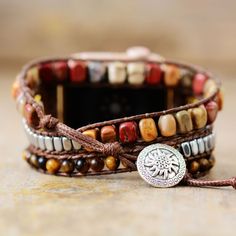 Showcase your style with this luxurious Boho Multilayer Wraps IWatch Strap, made with premium tiger eye, jasper and crystal beads. Its brown tones exude elegance and sophistication, making it the perfect accessory for your sophisticated look. Material: Jasper, Metal Beads, Crystal, Tiger Eye. 3 sizes: The length of watchband have 3 sizes: S-48cm/M-53cm/L-56cm. Fit for: Apple Watch series 8 7 6 5 4 3 2 SE. Band fits 5.3-7 inches wrist, compatible with 38mm-45mm apple watch face, easy to install, Handmade Watch Bands, Feel Empowered, Bracelet Apple Watch, Apple Watch Faces, Brown Tones, Tiger Eye Stone, Apple Watch Strap, The Tiger, Tigers Eye