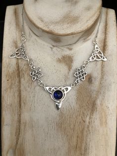 "I've fabricated a Victorian Bohemian style necklace with a center Celtic knot which features a center 10mm natural cabochon gemstone of your choosing, with two Trinity component pieces on either side, and two Celtic stenciling components to compliment the trinity knots. The sterling chain of 15 inches is soldered to each end making the approximate length of this piece just a bit over 18\" total. The chain will have a sturdy lobster claw. If you prefer a faceted gemstone, within a heavy 4 prong Artisan Birthstone Pendant Necklace, Artisan Birthstone Necklace For Gifts, Spiritual Necklaces With Round Natural Stones, Spiritual Sterling Silver Necklace With Round Stone, Amethyst Cabochon Necklace For Gift, Silver Bohemian Birthstone Necklace, Spiritual Cabochon Necklaces, Spiritual Cabochon Necklace, Artisan Sterling Silver Necklace With Birthstone