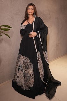 Black padded anarkali with contrast pipe, 3D floral, crystal embroidery on hem. Paired with churidar and contrast bordered sheer dupatta. - Aza Fashions Silk Abaya For Wedding And Festive Occasions, Festive Silk Abaya For Wedding, Designer Black Gown With Intricate Embroidery, Designer Black Gown With Sheer Dupatta, Black Gown With Sheer Dupatta For Designer Wear, Black Designer Gown For Eid, Silk Black Salwar Kameez With Chikankari Embroidery, Black Silk Anarkali Set With Dabka Work, Black Anarkali Gown With Dabka Work