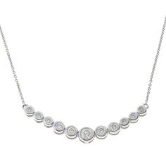 Ever Brilliant 10K Gold 1/5ctw Diamond Bezel-Set Graduated Necklace Sleek bezel settings give this graduated diamond design a feeling that's effortlessly elegant and distinctly modern. Perfect for deepening any fine-jewelry wardrobe.       Necklace approx. 18"L x 1/16"W      Drop approx. 1/8"L x 1-1/16"W     Stamped 10K white or yellow gold; rhodium plating or rhodium accenting     Cable-link chain: spring-ring clasp    Stone Information       All sizes and weights approximate     Total Carat Weight: 1/5ctw - ranges from 0.18ctw to 0.22ctw     White Diamond: Round; HI color, I1 clarity Jewelry Wardrobe, Graduation Necklace, Color Bands, Bezel Diamond, Diamond Design, 10k Gold, Bezel Setting, Spring Rings, Link Chain