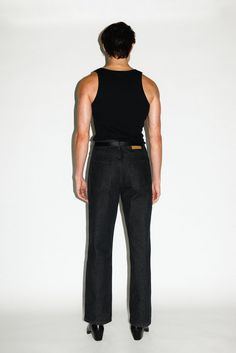 A classic pair of straight-leg jeans inspired by the off-duty uniform of 90's runway models. Designed to pinch just above the hips, the high-rise and roomy straight-leg elongates the leg for a rugged, boyish cut. Constructed in a rigid, non-stretch denim, these go-to jeans only gets better with age. Rigid Denim Flare Jeans With Straight Hem, Everyday Flare Jeans With Straight Hem In Rigid Denim, Modern Flare Jeans In Rigid Denim With Relaxed Fit, Modern Relaxed Fit Flare Jeans In Rigid Denim, Modern Flare Jeans With Straight Hem, Streetwear Flare Jeans With Straight Hem, Modern Rigid Denim Jeans With Straight Hem, Relaxed Fit Rigid Denim Flare Jeans With Belt Loops, Relaxed Fit Rigid Denim Flare Jeans