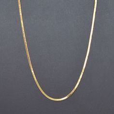 Hi Everyone on Etsy! This listing is for 1 strand of chain only. Item Details: Lead and Nickel Free Clasp : Lobter claw Chain Style : Round Cocoon Snake Chain 24K gold plated Length : 19.7Inches Thickness: 0.9mm x 1.7 width on Chain This is a very simple charming chain, a fine chain and perfect for that minimalist looks. Please avoid chemical solutions, perfumes, excessive sweat, ocean water and swimming water. Salt water and chlorine can damage your jewelry. Chlorine can damage and discolor met Metal Herringbone Necklace Gift, Gift Herringbone Necklace With Delicate Metal Chain, Gold Snake Chain Necklace Gift, Adjustable Link Snake Chain Necklace Gift, Gift Snake Chain Necklace With Adjustable Link, Gift Snake Chain Necklace With Delicate Chain, Excessive Sweating, Sandwich Bags, Necklace Making