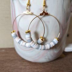 "+ Style name: Pale Pastel with Gold Beaded Hoops + beaded dangle hoop earrings with clay heishi beads and gold bead accent + Hoops are 1 1/2\" diameter + gold hoops with ear wire + All lizcorcreative hoop earrings will come packaged on a hand-stamped kraft earring card in a clear sealed bag Free Domestic Shipping Follow along Instagram https://www.instagram.com/lizcorcreative/ Facebook https://www.facebook.com/profile.php?id=100063235479850 Pinterest https://www.pinterest.com/lizcorrinne/ If th Heishi Earring Ideas, Handmade White Heishi Beads Earrings, Nickel-free Heishi Beads Earrings, Heishi Beads Small Hoop Earrings As Gift, Small Hoop Heishi Beaded Earrings As Gift, Heishi Beads Dangle Earrings For Gift, Handmade Heishi Beads Earrings For Gift, Handmade Heishi Beads Earrings Gift, Round Heishi Beads Earrings Gift