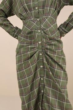 Cooler days always get us searching for the perfect fall looks, like the Lulus Seasonal Spirit Green Plaid Ruched Long Sleeve Midi Dress! Lightweight woven fabric boasts a timeless plaid pattern as it shapes long sleeves (with button cuffs) and a collared neckline. Functional button placket runs the length of the dress, across a fitted waist and a strategically ruched skirt that finishes at a midi hem. Fit: This garment fits true to size. Length: Mid-calf length. Size medium measures 47" from sh Ruched Skirt, Sleeve Midi Dress, Long Sleeve Midi, Long Sleeve Midi Dress, Green Plaid, Fall Looks, Button Placket, Plaid Pattern, Mid Calf