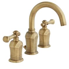 an antique brass faucet with two handles