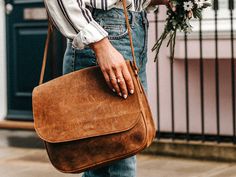 Our original Hunter leather with raw texture is paired with an iconic style in this new women's handbag. This leather bag is the best Valentine's Day gift ideas for her! #valentine #giftideas #giftideasforher #leathergifts Vintage Leather Travel Bag, Large Leather Purse, Raw Texture, Leather Bag Handmade, Saddle Handbags, Brown Leather Satchel, Backpack Free