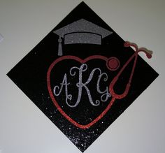 a black graduation cap with a stethoscope on it and a red heart