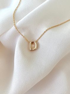 **Each piece in my shop, I personally create and photograph. (All photos are property of The Cord Gallery LLC) Thank you for supporting my small business. Tiny Gold Initial Necklace -  Gold Filled Now all Gold Filled - Waterproof! Add a personal touch to your accessories collection with this Dainty Gold Initial Necklace!  Features a 18k Gold Filled Mini Initial Letter. Each letter is 3D for added interest and texture and hangs seamlessly on your choice of Gold Filled Link or Gold Filled Box chai Necklace Initial Letter D, How To Photograph Necklaces, Wishlist Summer, Letter Necklace Initials, Necklace Girlfriend, Letter Charm Necklace, Small Letter, Dainty Initial Necklace, Gold Initial Necklace